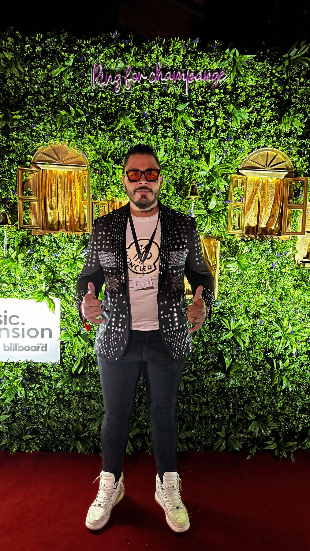 Evan Halls on the carpet at a Billboard Brasil Music Mansion event in Miami