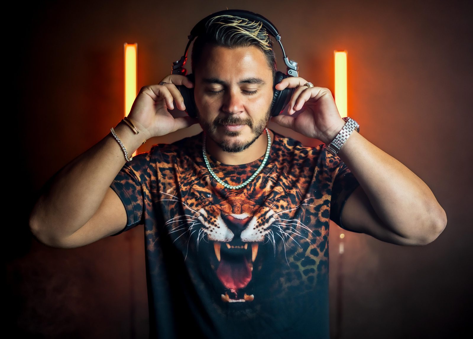 DJ Evan Halls press photo, neon studio portrait