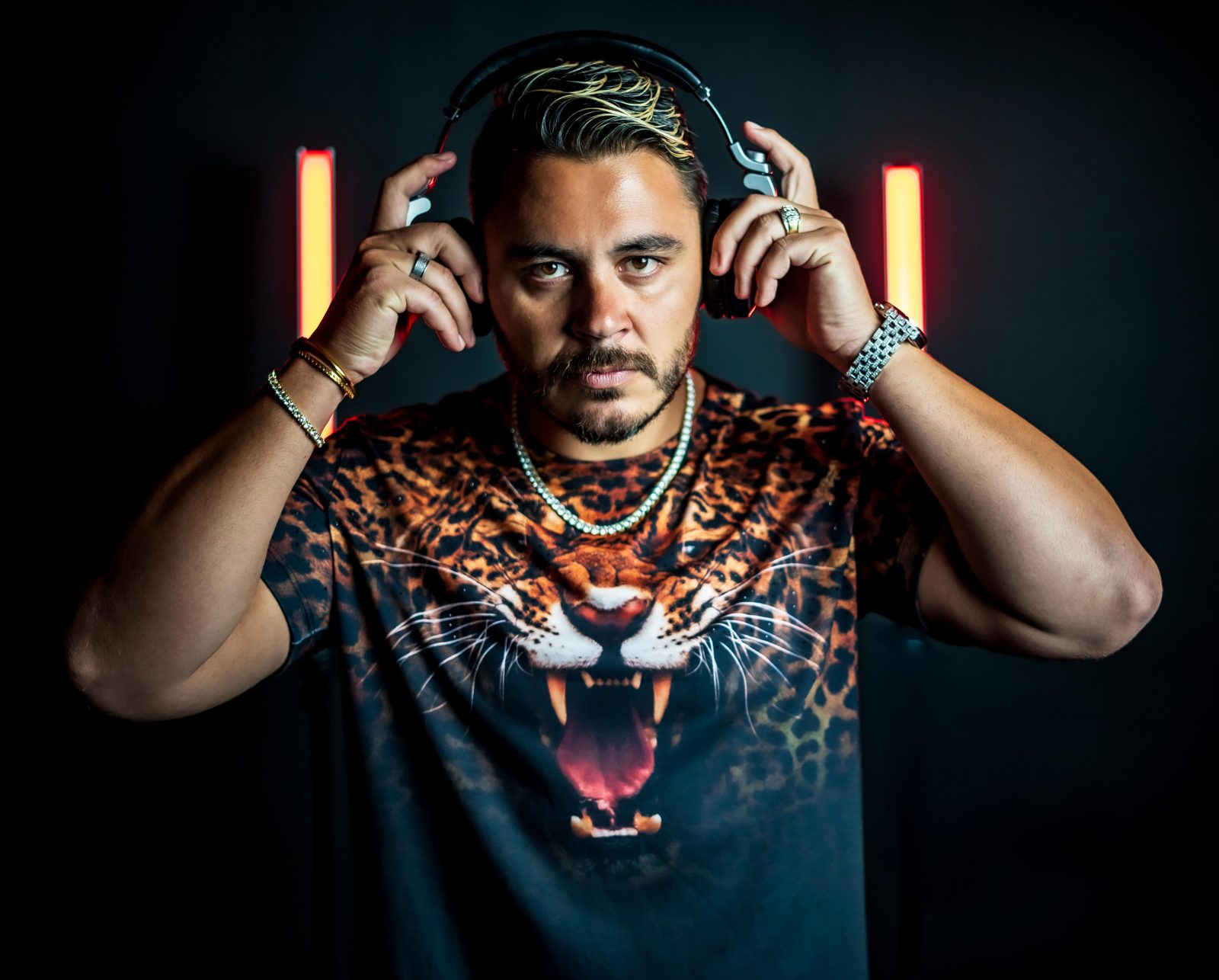 DJ Evan Halls press photo, blue neon portrait
