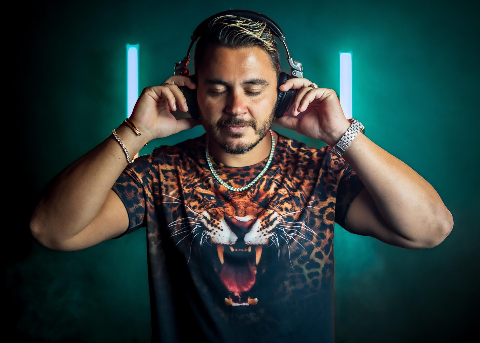 DJ Evan Halls press photo, green neon portrait